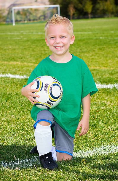 istock Cute little Soccer player portrait 462845335