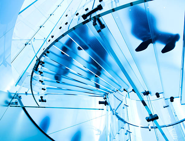 istock people on glass staircase 462846443