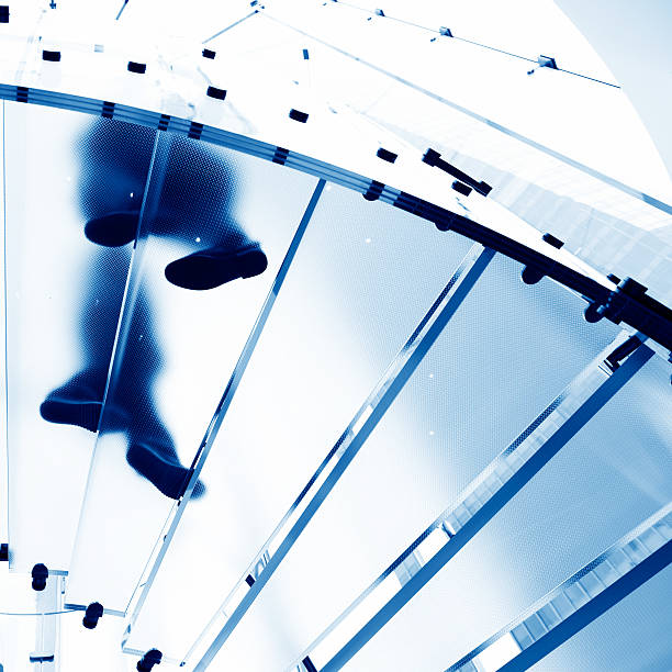 istock people on glass staircase 462846453