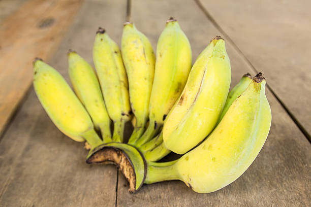 istock Bananas on wooden background 462846807