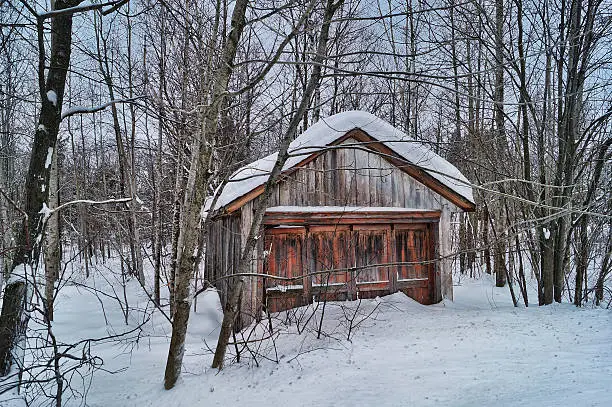 Photo of Canadian Old barn in a winter landscape