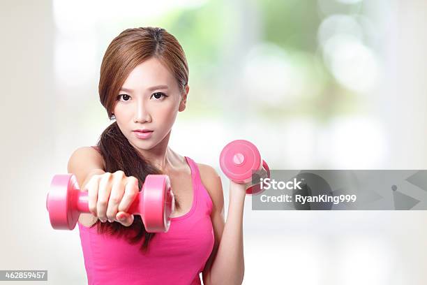 Young Sport Girl With Dumbbells Stock Photo - Download Image Now - Adult, Asia, Asian and Indian Ethnicities