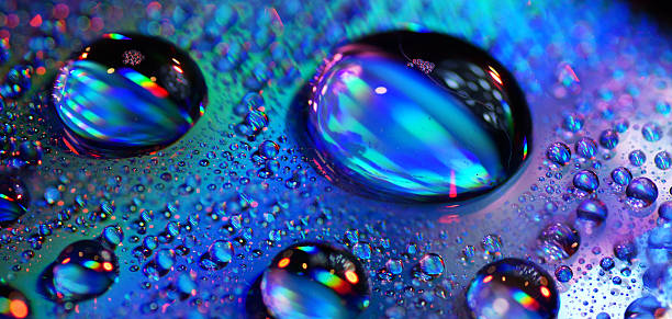 istock Macro of Water drops on a DVD surface 462860103