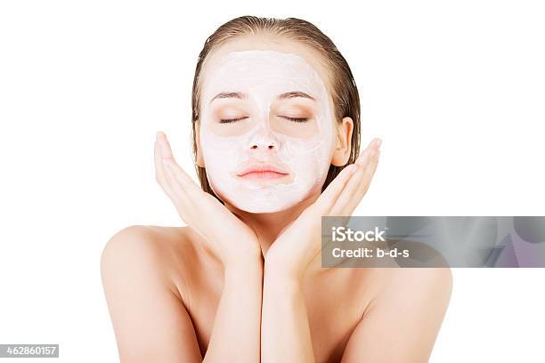 Beautiful Woman With Clay Facial Mask Stock Photo - Download Image Now - Mask - Disguise, Human Face, Facial Mask - Beauty Product