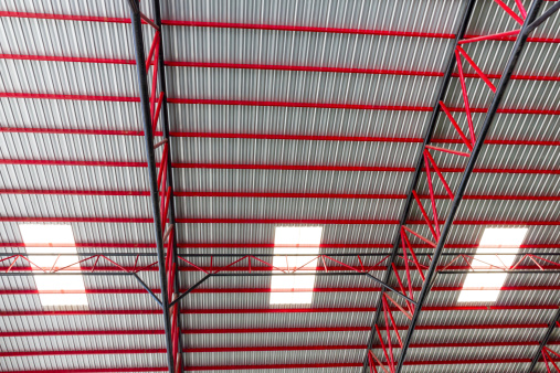 Metal roof with red construction
