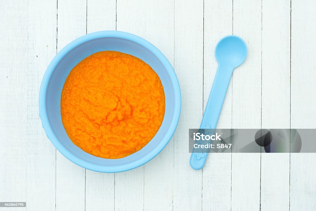 Jedzenie dla niemowląt - Zbiór zdjęć royalty-free (Pomarańczowy)