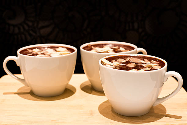Chocolate mousse with almond in a white cup