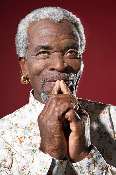 istock Senior Man With Fingers On Mouth 462863719
