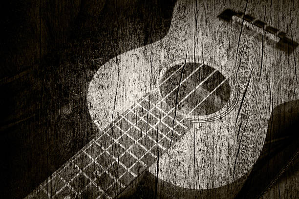 istock Ukulele in the wood texture background 462868731