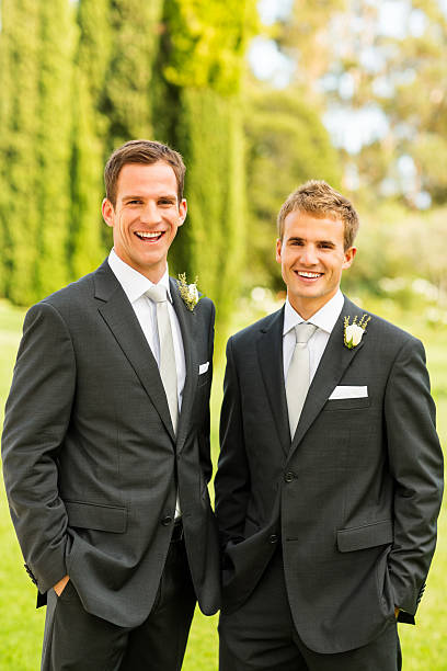 istock Best Man And Groom Standing With Hands In Pockets 462872929