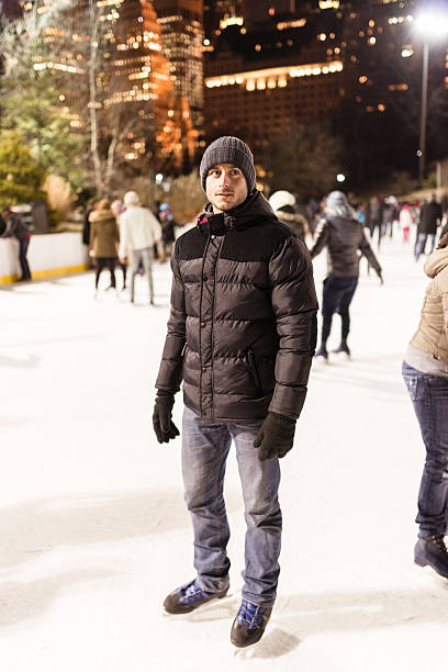 istock Serious man on the Central Park ice rink - winter 462873073