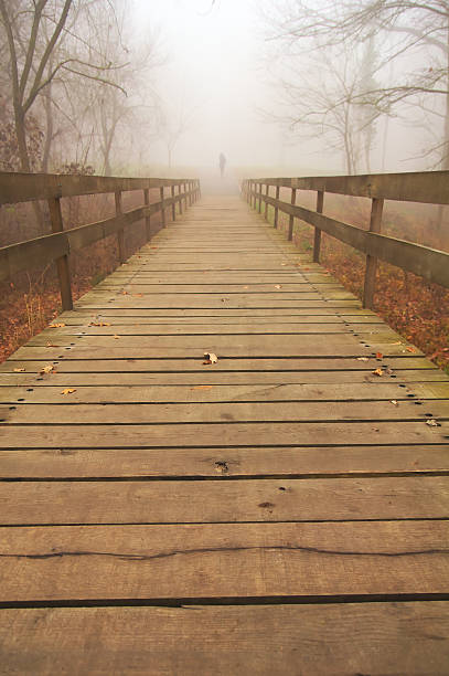 istock Woman in fog 462875131