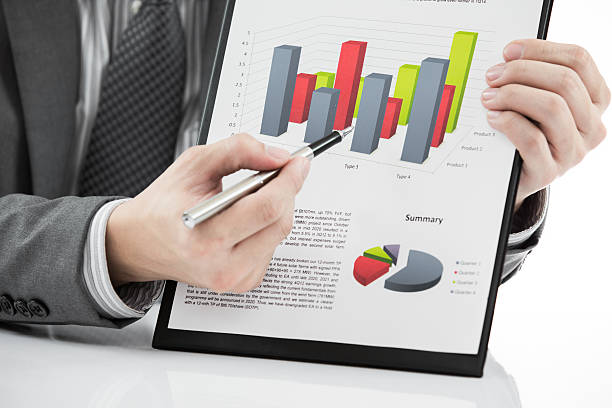 istock man hand and business report 462880453