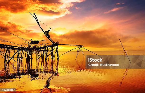 Fisherman Silhouette On Fishnets Stock Photo - Download Image Now - Activity, Adult, Asia