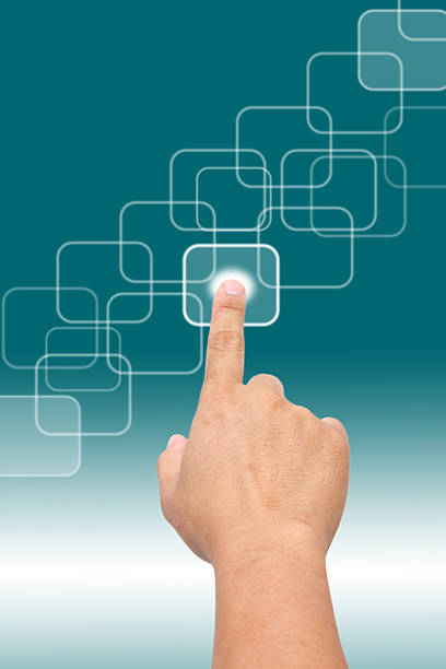 Businessman pressing button on virtual screen. Man pointing at a futuristic interface. Digital communication and virtual technology concept.