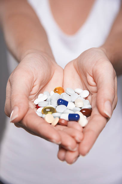 istock Closeup Of Hands With Colorful Pills 462901095