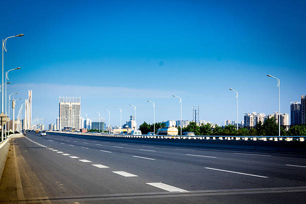 istock speeding truck go through the bridge 462918933