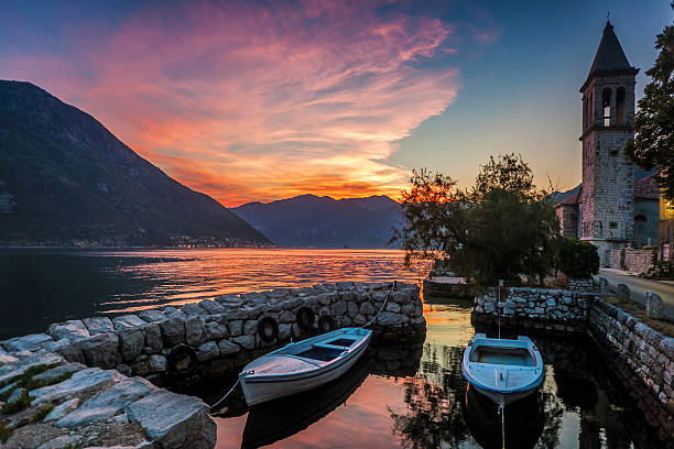 istock Sunset on the sea with mountains 462938461