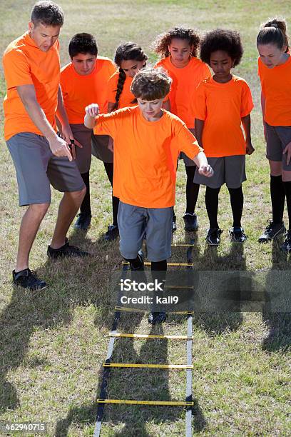 Children Using Agility Ladder Stock Photo - Download Image Now - 10-11 Years, 20-29 Years, 8-9 Years