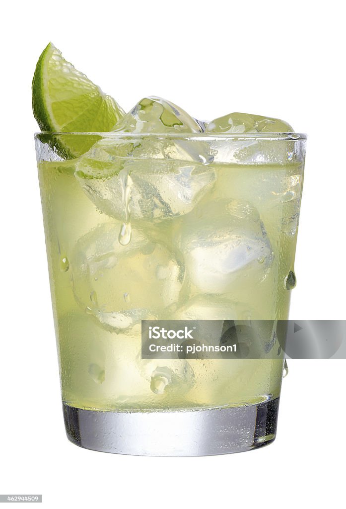 Margarita Margarita in a short glass on the rocks with a lime wedge.  Professionally shot, color corrected, exported 16 bit and retouched for maximum image quality, larger files include clipping path. Margarita Stock Photo