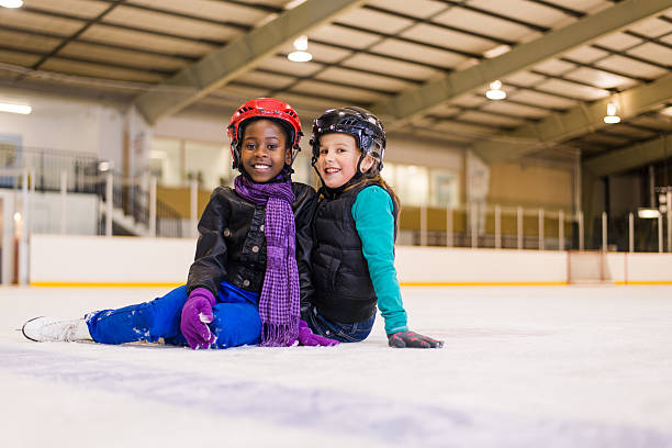 People having fun on skating rink