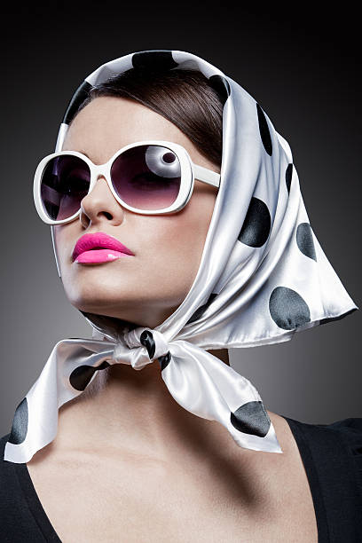 istock A brunette wearing a head scarf and a sunglasses 462952843