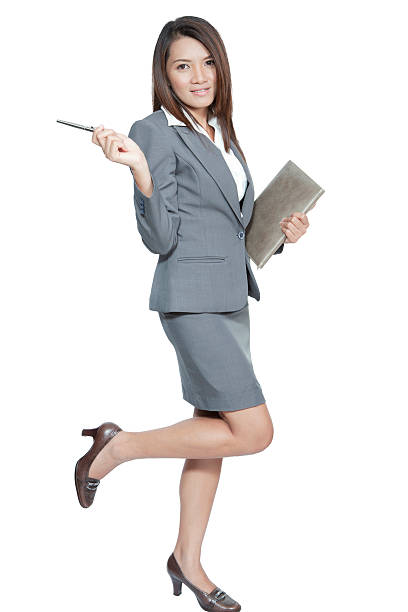 istock Full length business woman gesture pen diary note book smiling 462955145