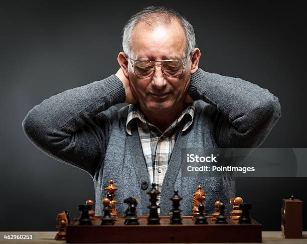 Senior Man Playing Chess Stock Photo - Download Image Now - 60-64 Years, Achievement, Active Lifestyle