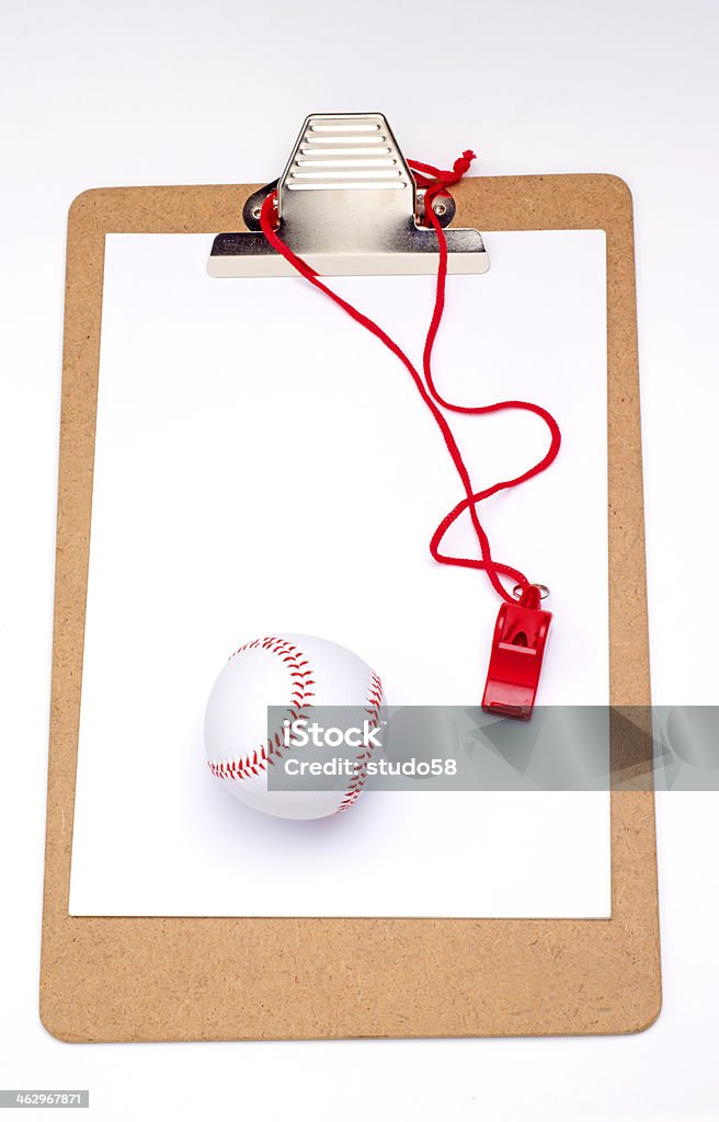 clipboard whistle and baseball on clipboard American Culture Stock Photo