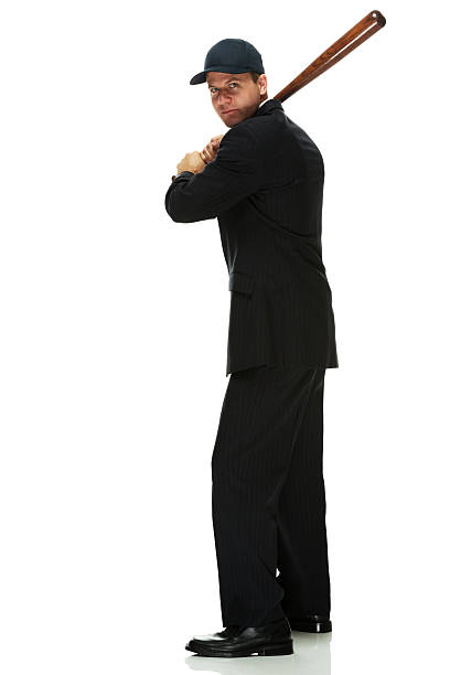 istock Businessman in action with baseball bat 462968919