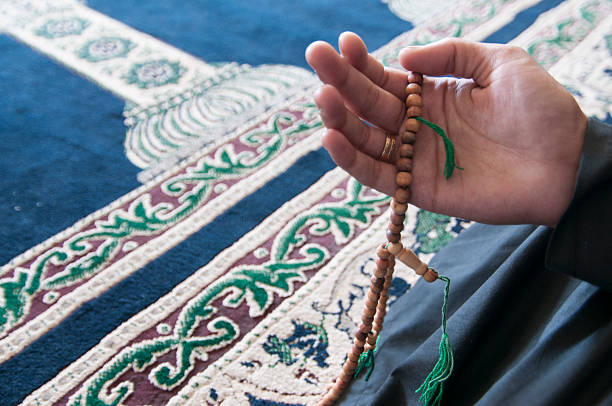 istock Muslim man holding beads in his hand 462968971
