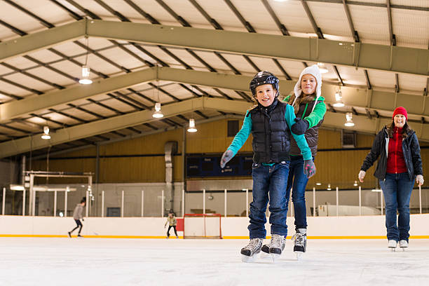 istock People having fun on skating rink 462973843