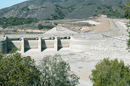 Bradbury Dam at Lake Cachuma Reservoir during drought in Santa Ynez County in California