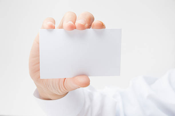 human hand holding Business Card stock photo