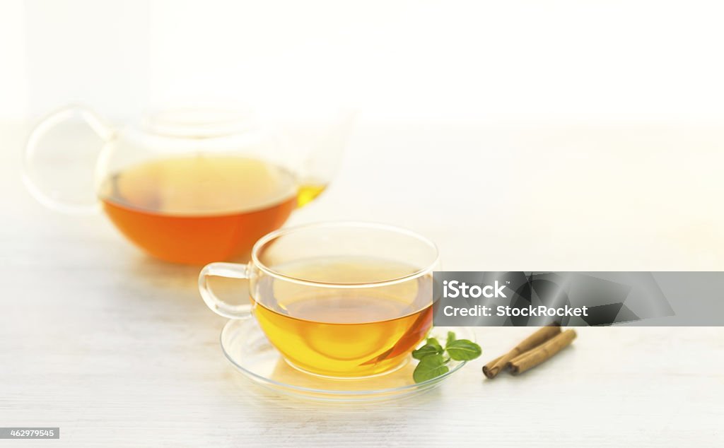 Cup of tea Transparent cup of tea with cinnamon sticks Afternoon Tea Stock Photo