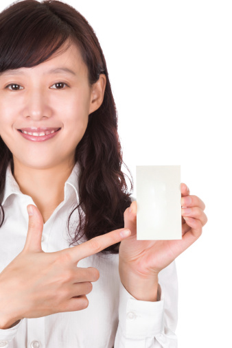 Asian Bussiness woman showing business card