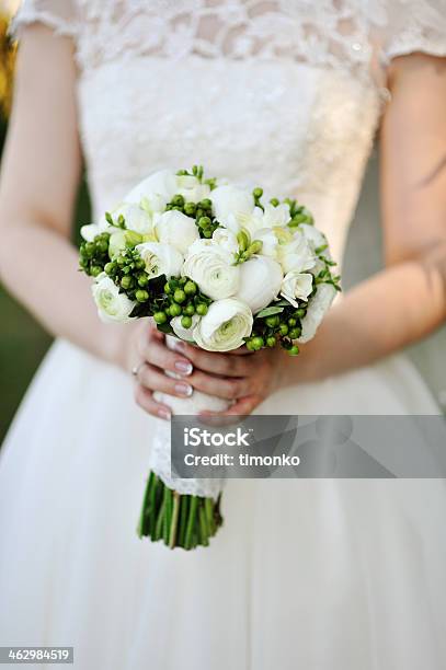 Wedding Bouquet In Hands Of The Bride Stock Photo - Download Image Now - Beauty, Bouquet, Bride
