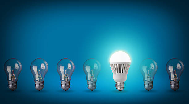 istock A different type of bulb in a row of glass light bulbs 462984523