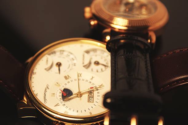 istock Two golden luxury chronometers (macro) 462989029
