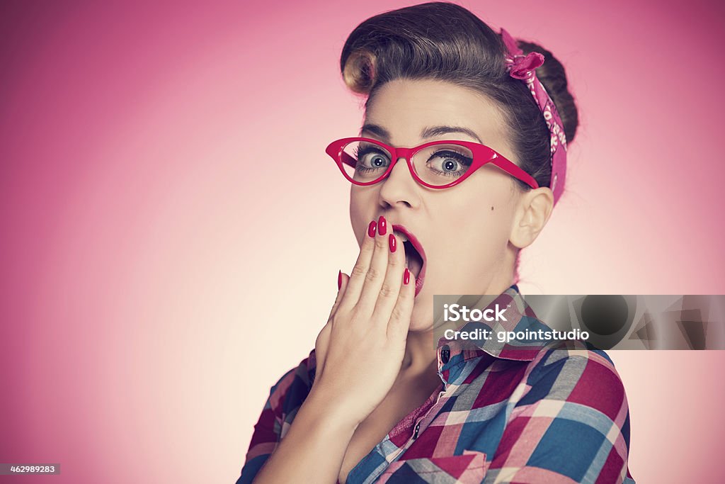 Portrait of shocked pin-up girl Women Stock Photo