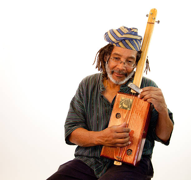 istock Musician Tuning His Guitar 462999331