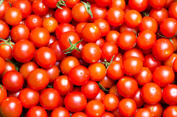cherry tomatoes red cherry tomatoes background cherry tomato stock pictures, royalty-free photos & images