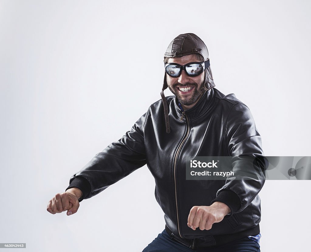 Smiling Man Posing As A Motorcyclist Stock Photo - Download Image Now - Motorcycle, White Background, Bicycle - iStock Smiling Man Posing As A Motorcyclist Stock Photo - Download Image Now - Motorcycle, White Background, Bicycle - iStock