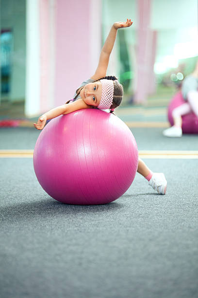 istock Kid doing fitness exercises 463042739