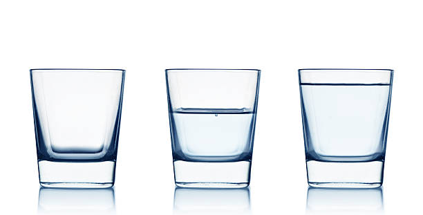 Three clear glasses with different amounts of water in them