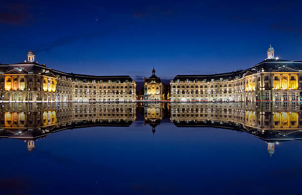 Bordeaux, France - August 17, 2019: Tourists in the famous Water Mirror in the Stock Exchange square area