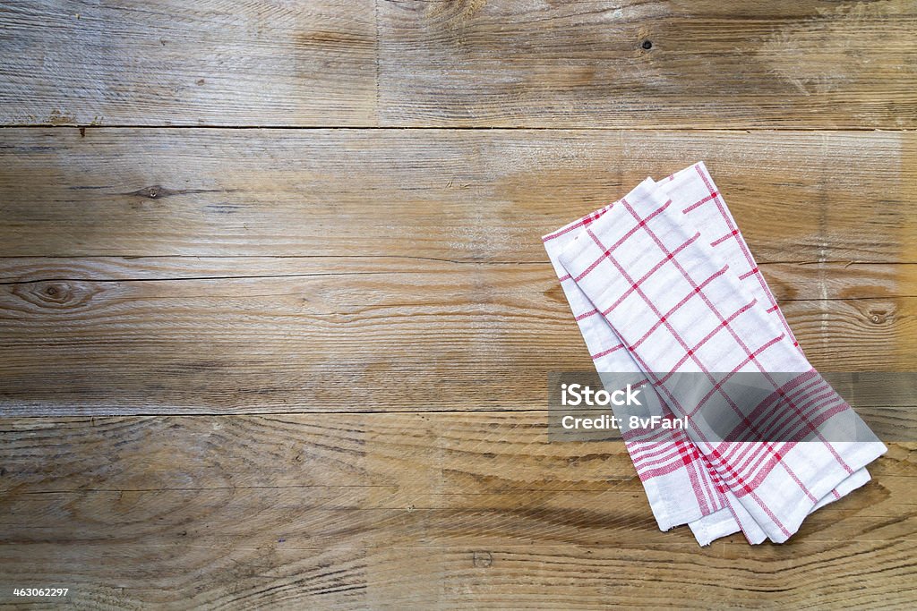 Kitchen cloth background Red kitchen towel on light wood background Dish Towel Stock Photo