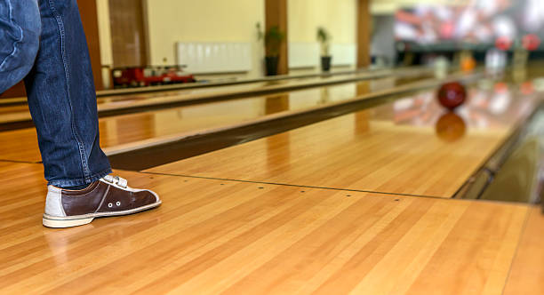 istock man legs with bowling shoes 463070531