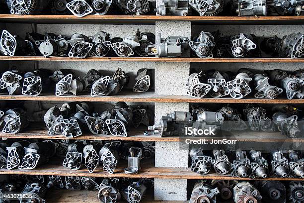 Collection Of Auto Part Alternators On Shelves Stock Photo - Download Image Now - Auto Repair Shop, Brown, Collection