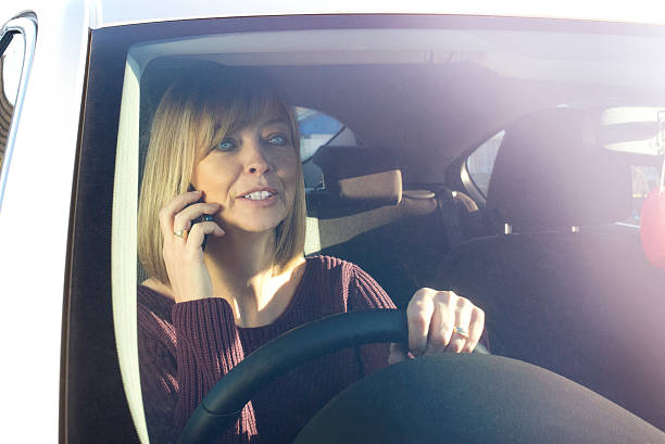 istock Driving whilst on the phone 463076963
